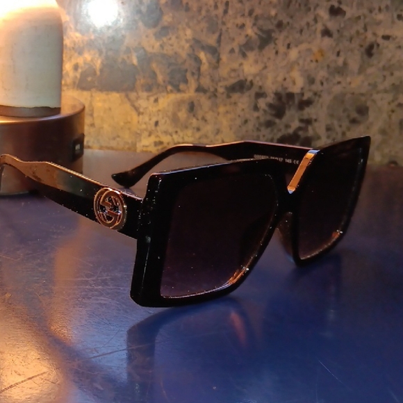 Gucci Other - Gucci Black and Gold Designer Sunglasses